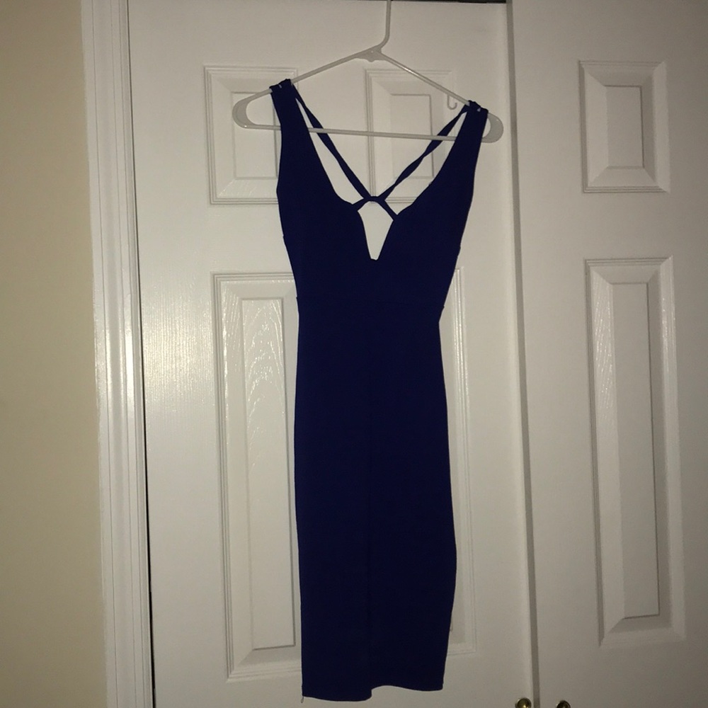 Beautiful form fitting deep blue dress